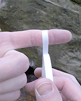 Taping finger with optimal width, pre-cut eXoTendon - Finger Tape.